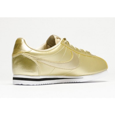 nike cortez black and gold womens